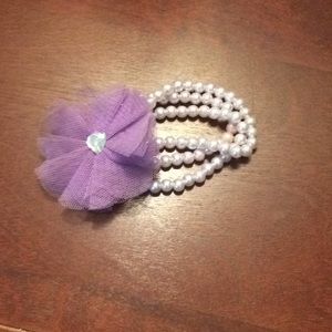 Purple bracelet with purple flower